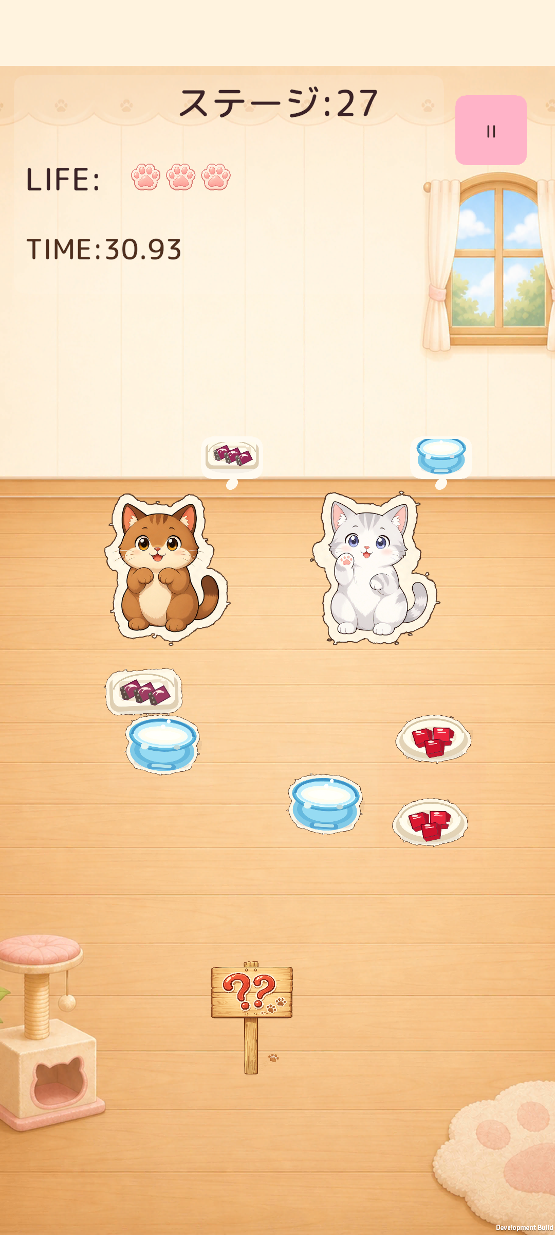 複数の猫とおやつが登場するステージ27のプレイ画面